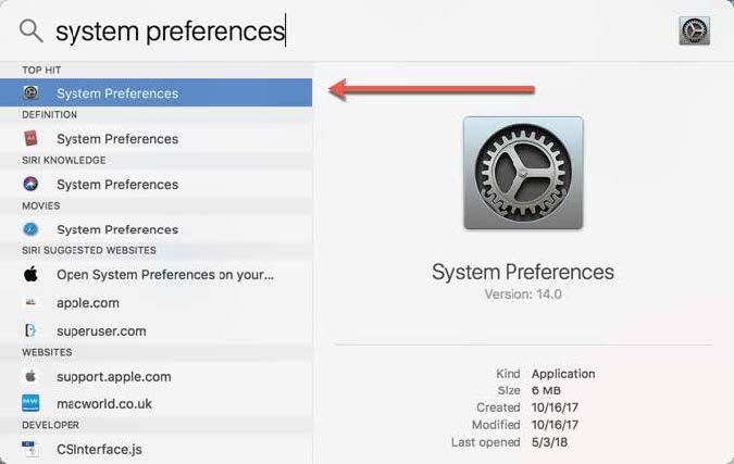 Screenshot of search results for "system preferences", with a red arrow pointing to the System Preferences app icon in the results.